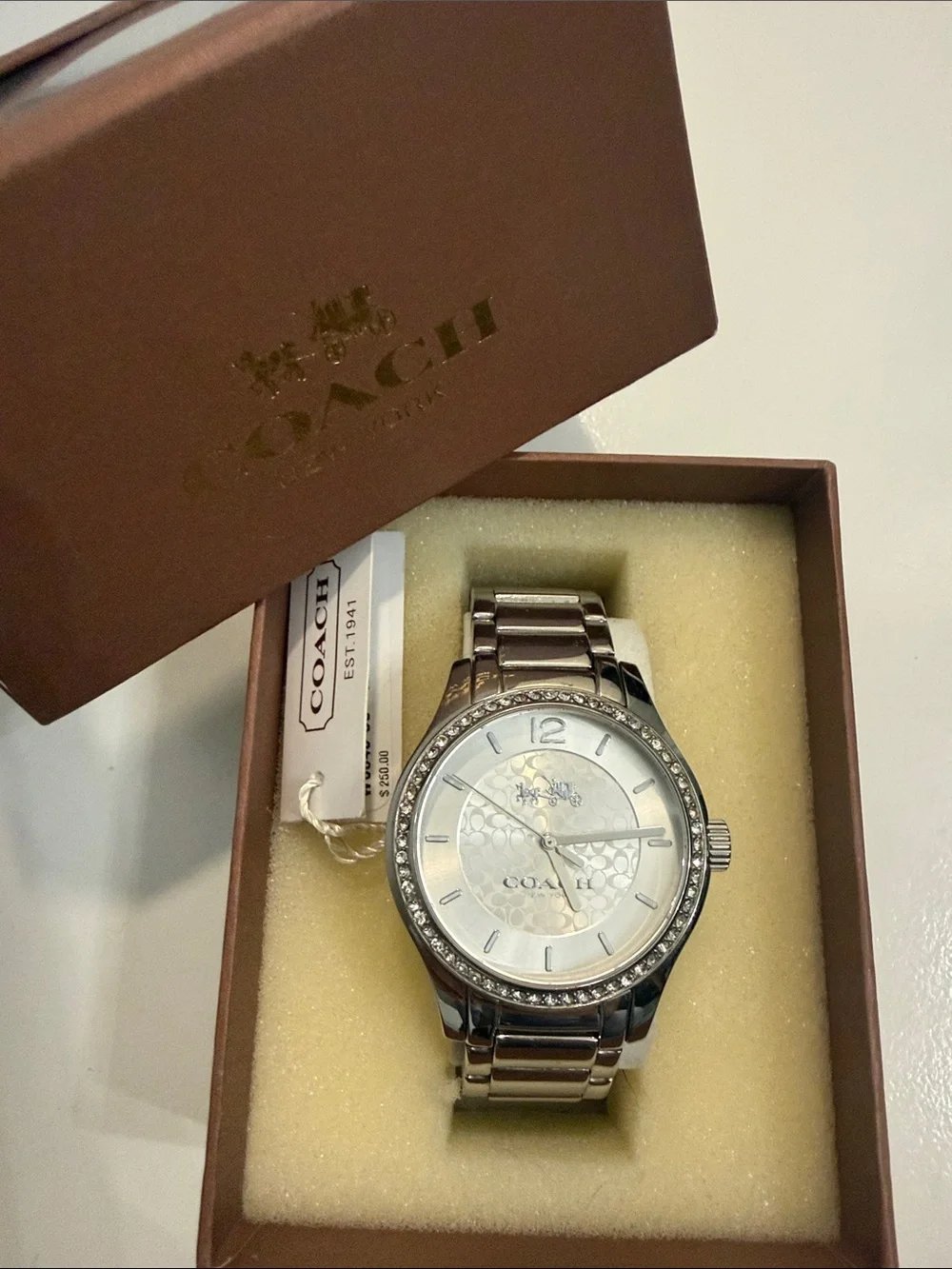 COACH Women’s Silver “Maddy” Watch with Crystal Bezel